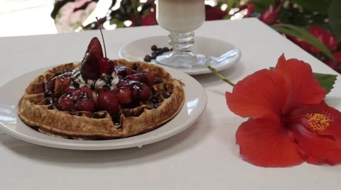 Delicious breakfast with waffle ready  on the table Vidéo 61891551