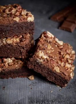 Delicious brownies with walnuts in a stack Stock Photos