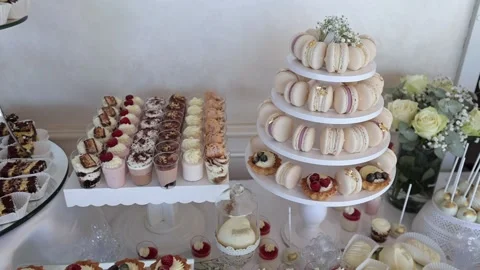 Delicious buffet desserts, sweets, decor, beautiful table setting Stock Footage 205324972
