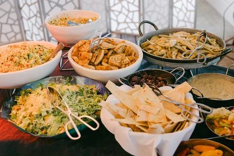 Delicious buffet spread featuring a variety of Mediterranean dishes at a festive Stock Photos