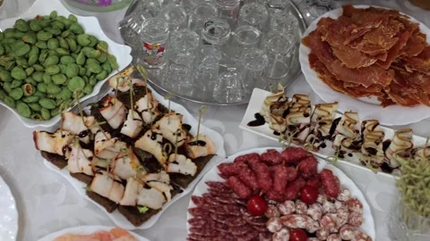 A delicious buffet table, many different snacks. A Cossack table at a Ukrainian Stock Footage 288482564