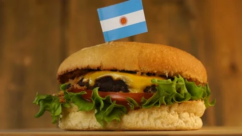 Delicious burger with small Argentinian flag on top of them with toothpicks Stock Footage 144963433