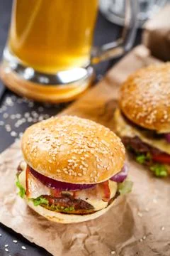 Delicious burger on wooden board Stock Photos