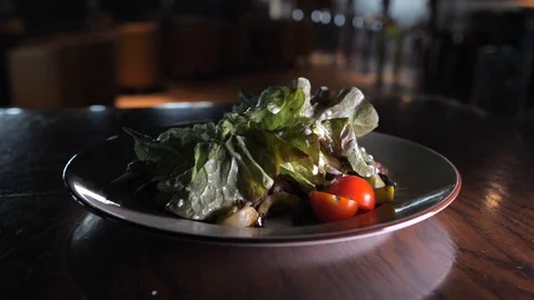 Delicious Caesar salad on a large white plate. Stock Footage 127155268