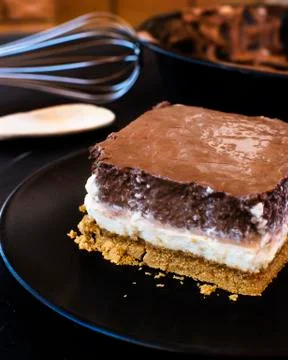 Delicious cake composed of three chocolates. Stock Photos