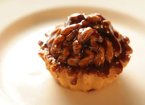 Delicious cake with nut, chokolate and caramel. Stock Photos