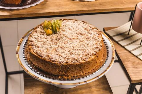 Delicious Cake On a Perfect Table With Snacks Stock Photos