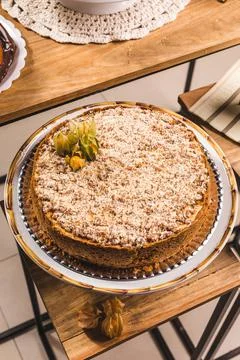 Delicious Cake On a Perfect Table With Snacks Stock Photos