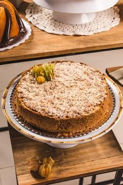 Delicious Cake On a Perfect Table With Snacks Stock Photos