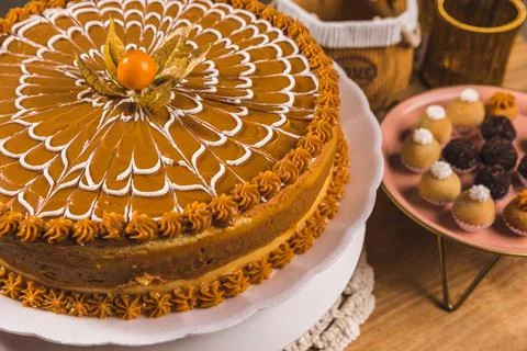 Delicious Cake On a Perfect Table With Snacks Stock Photos