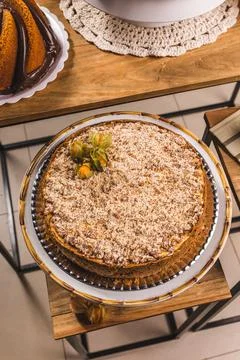 Delicious Cake On a Perfect Table With Snacks Stock Photos