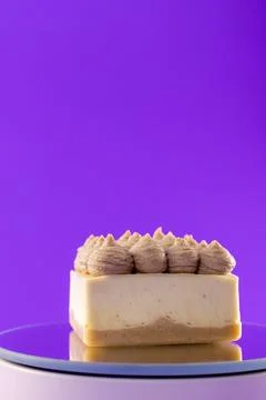 Delicious cake on a table with a purple background during daytime Stock Photos