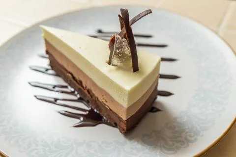 Delicious cake with three different kind of chocolate Stock Photos