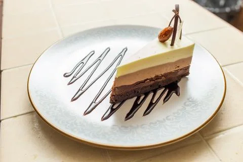 Delicious cake with three different kind of chocolate Stock Photos
