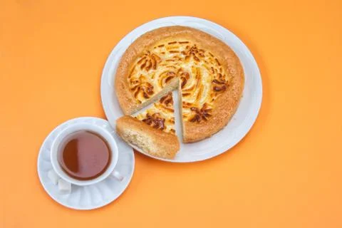 Delicious cheese pie with tea Stock Photos