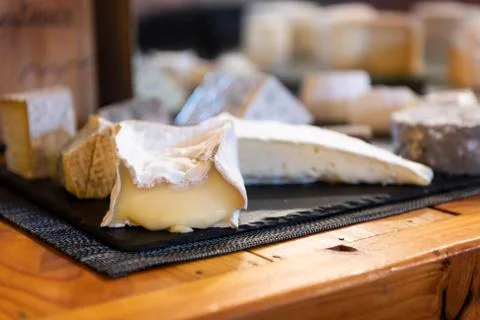 Delicious cheese on a table Stock Photos