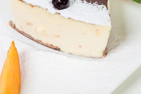 Delicious cheesecake with mango. Stock Photos