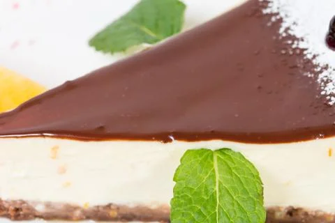 Delicious cheesecake with mint. Stock Photos