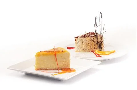 Delicious Cheesecake on white background Stock Photos