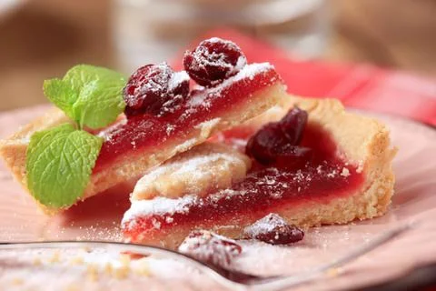 Delicious cherry pie slice on white plate Stock Photos