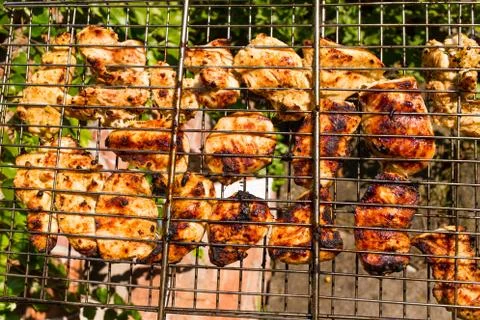 Delicious chicken on the grill. 스톡 사진
