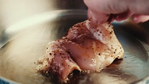 Delicious chicken steaks fried in a pan. Video stock 132654304