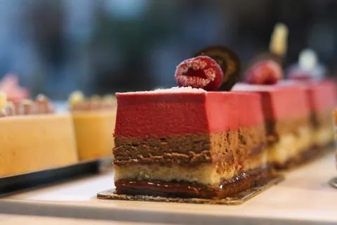 Delicious Choco Raspberry layered cake with vibrant red top and chocolate l.. Stock Photos
