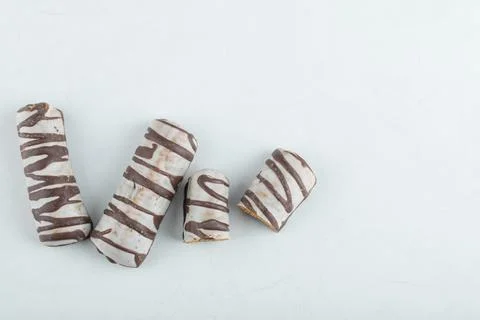 Delicious chocolate bars on a white background Stock Photos