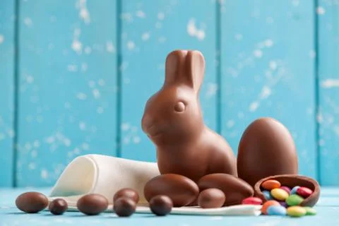 Delicious chocolate Easter bunny, eggs and sweets Stock Photos