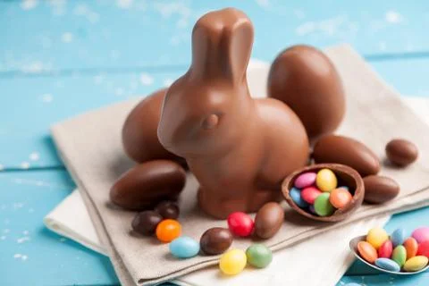 Delicious chocolate Easter bunny, eggs and sweets Stock Photos