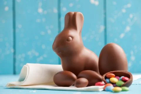 Delicious chocolate Easter bunny, eggs and sweets Stock Photos