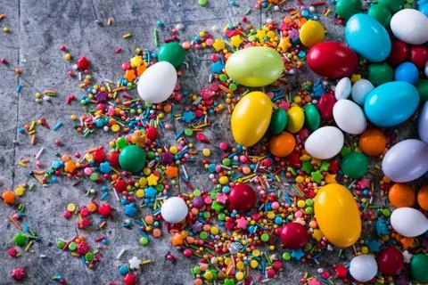 Delicious chocolate easter eggs ,bunny and sweets on dark background Stock Photos
