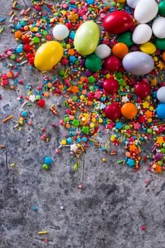 Delicious chocolate easter eggs ,bunny and sweets on dark background Stock Photos