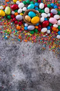 Delicious chocolate easter eggs ,bunny and sweets on dark background Stock Photos