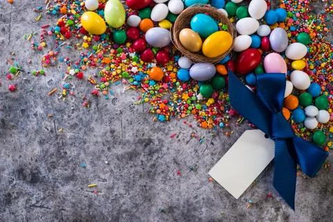 Delicious chocolate easter eggs ,bunny and sweets on dark background Stock Photos