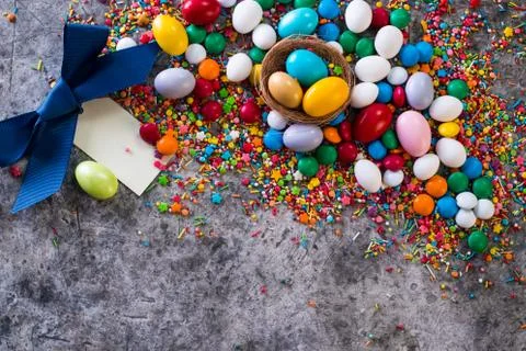 Delicious chocolate easter eggs ,bunny and sweets on dark background Stock Photos