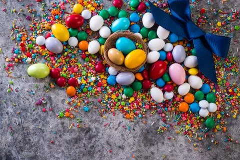 Delicious chocolate easter eggs ,bunny and sweets on dark background Stock Photos