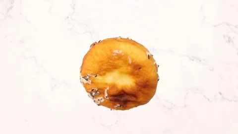 Delicious chocolate glazed donuts rotating - Stop motion Stock Footage 128581829