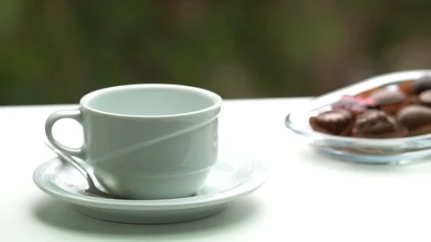 Delicious chocolates box with hot coffee on the table Vidéo 85965443