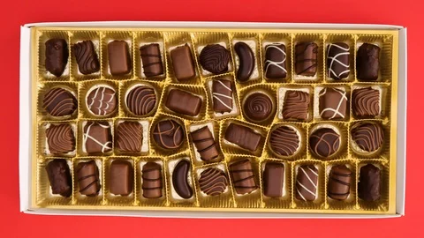 Delicious chocolates disappear from the box - Stop motion 스톡 동영상 129745565