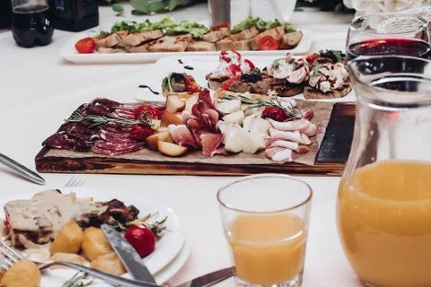Delicious cold meat platter on table.View over wedding reception with cold meat Fotos Stock