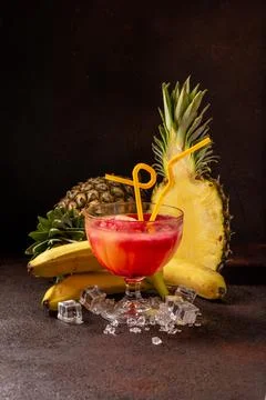Delicious cold refreshing ananas smoothie drink with banana and redcurrant se Stock Photos