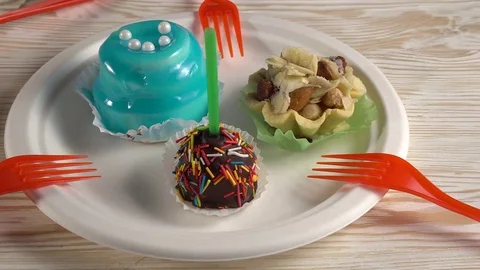 Delicious colourful cup cakes. Stock Footage