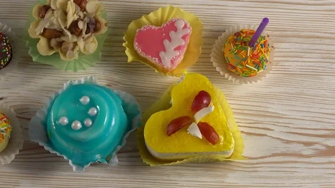 Delicious colourful cup cakes. Stock-Footage 74238829