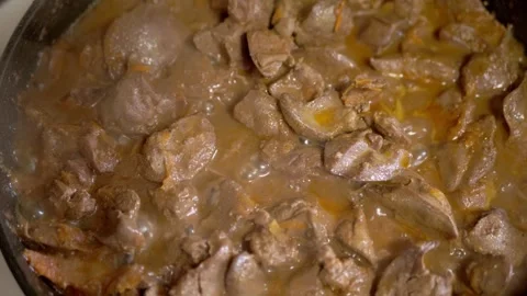 Delicious Cooked Chicken Liver Simmering in Brown Gravy Sauce in Pan Stock Footage 339069088