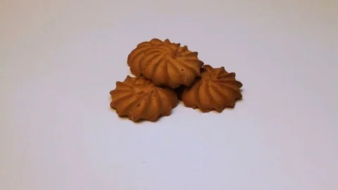 Delicious cookies rotating on white background Stock Footage 84893969