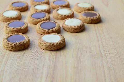 Delicious cookies on a wooden background Stock Photos