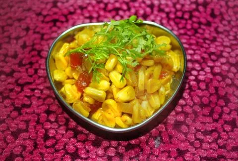 Delicious corn bhel or corn chat . Stock Photos