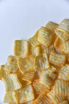 Delicious corn chips with pepper close-up Stock Photos