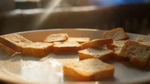Delicious crackers in a plate. Close-up. Slow motion Stock Footage 144397876